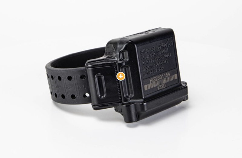 Side view of a BI HomeGuard 20|20 ankle monitor, showcasing its RF monitoring system design.