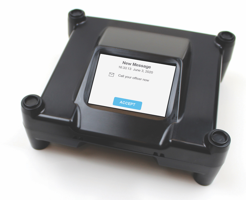 From above image of BI HomeGuard 20|20 base station with a contemporary touch screen facilitating communication between officers and clients.